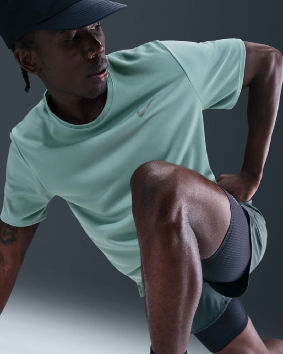 Nike Miler Mens Dri-FIT UV Short-Sleeve Running Top - Cannon Green